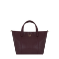 Burgundy leather handbag with gold accents on a white background