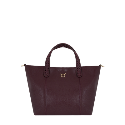 Burgundy leather handbag with gold accents on a white background